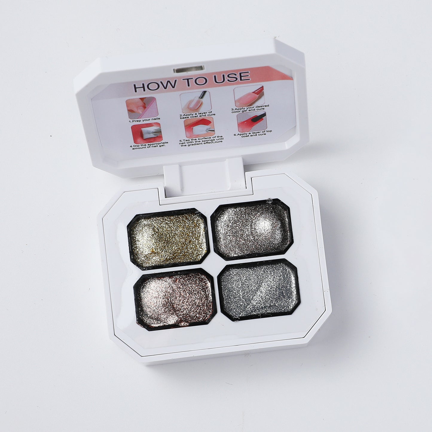 Open 4-color JKN Art platinum semi-solid patting gel set showing gold, silver, rose gold and gray shimmer shades.