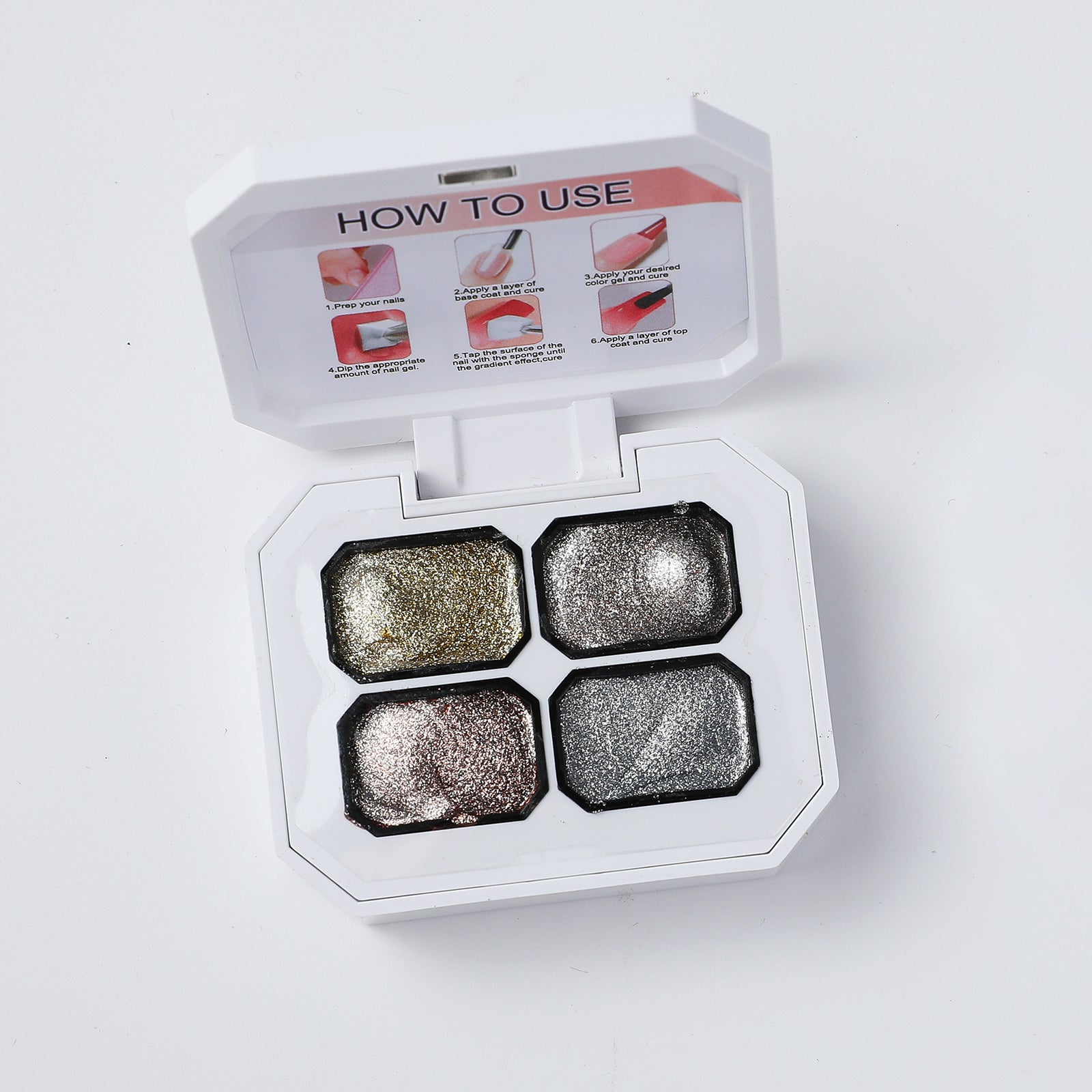 Open 4-color JKN Art platinum semi-solid patting gel set showing gold, silver, rose gold and gray shimmer shades.